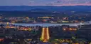 Canberra at dusk seen from Mount Ainslie, with Anzac Parade leading to the lake