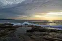Rocks and waves on the coast at Coogee at sunrise