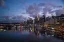 Darling Harbour at dusk with city lights reflected in the water