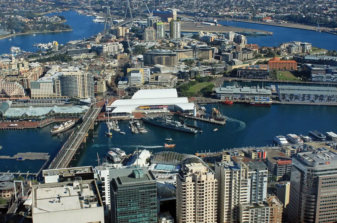 Darling Harbour and the city seen from high above, with the water and bridges below
