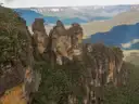 The Three Sisters rock towers in the Blue Mountains above the forested Jamison Valley